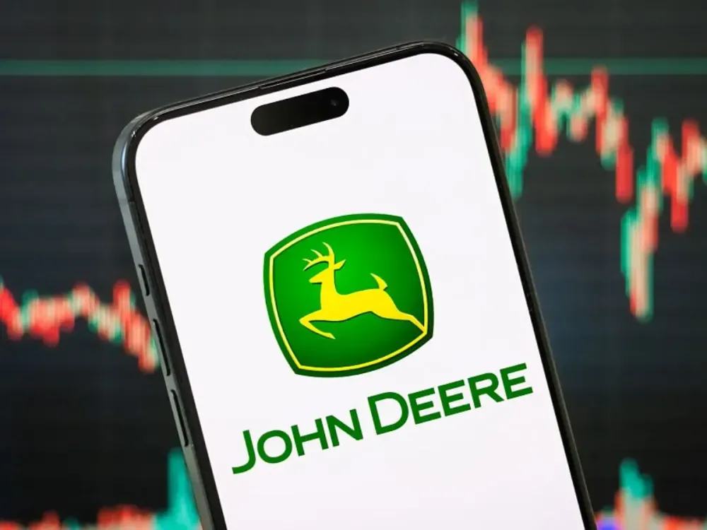  In this photo illustration, the logo of Deere & Company (John Deere) is displayed on a smartphone screen.