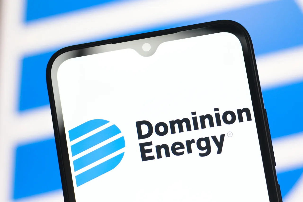  In this photo illustration, the Dominion Energy logo is seen displayed on a smartphone screen. (Photo Illustration by Thomas Fuller/SOPA Images/LightRocket via Getty Images)