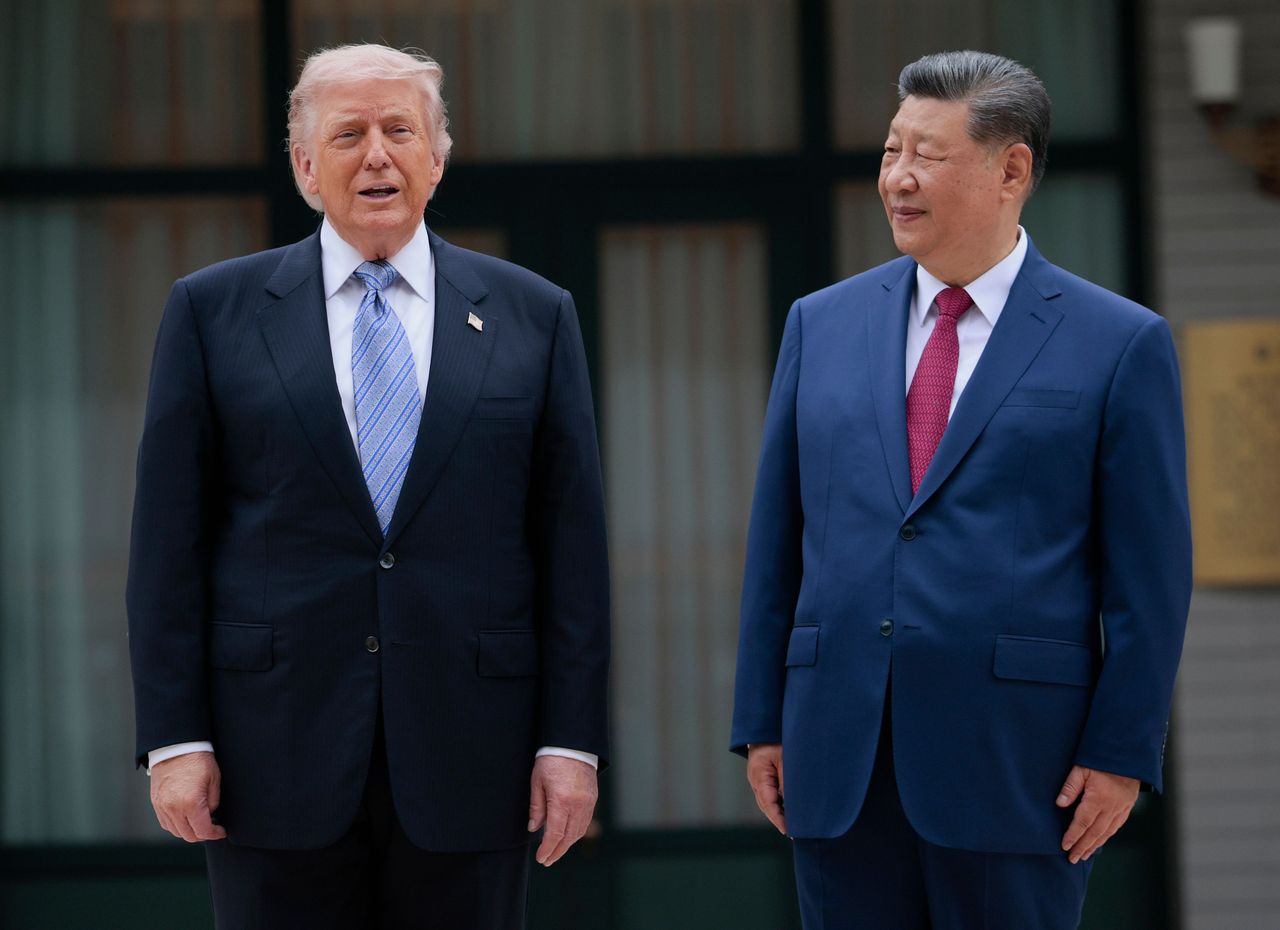 President Donald Trump and Chinese President Xi Jinping pose for photos at Zhongnanhai Garden on May 15, 2026 in Beijing, China. (Photo by Evan Vucci-Pool/Getty Images)