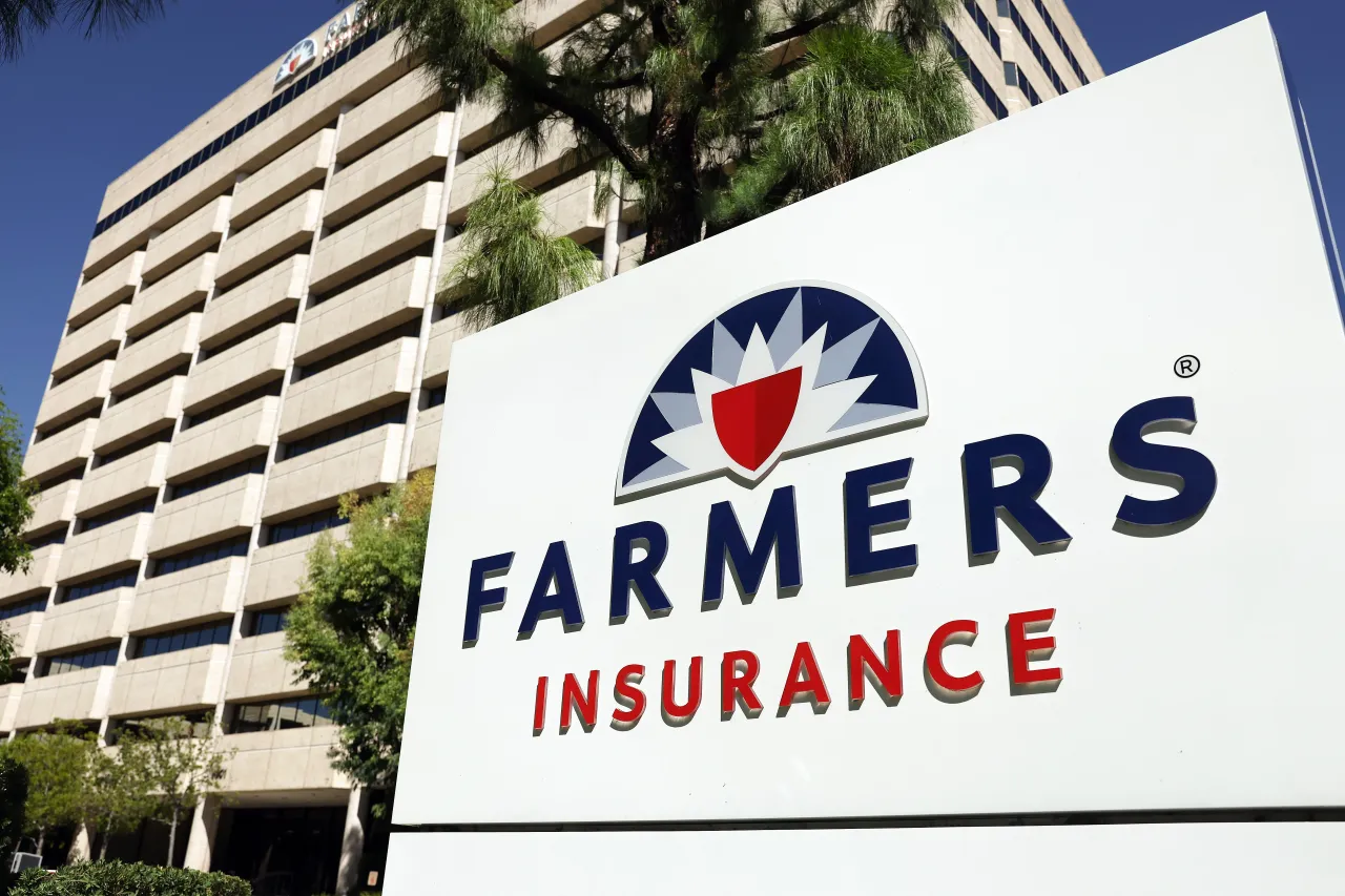 The Farmers Insurance logo is displayed outside company headquarters on August 29, 2023 in Woodland Hills, California. 