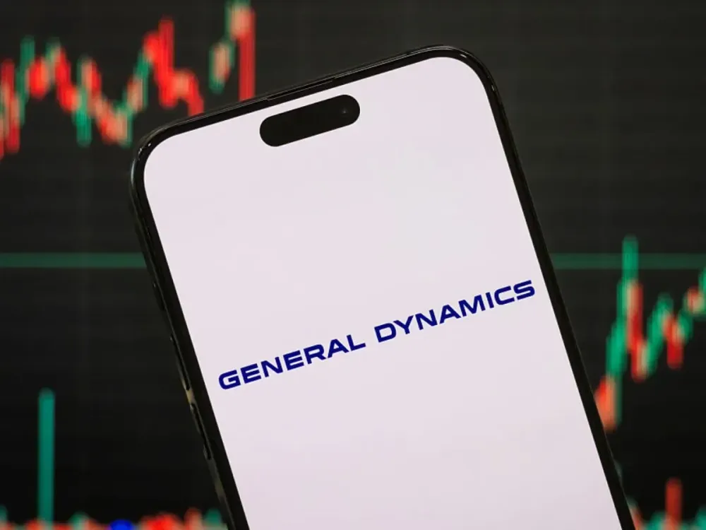 In this photo illustration, the logo of General Dynamics Corporation is displayed on a smartphone screen. (Photo illustration by Cheng Xin/Getty Images)
