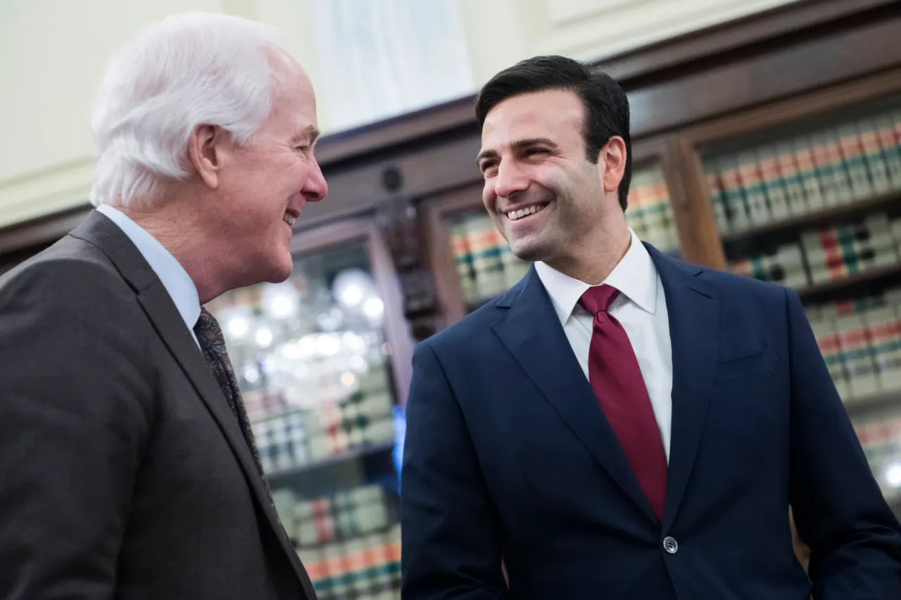 Heath Tarbert, right, talks with Sen. John Cornyn, R-Texas, in Russell Building on Wednesday, March 13, 2019. (Photo By Tom Williams/CQ Roll Call)