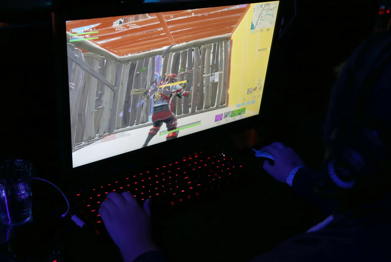 A gamer participates in the "Fortnite" Duos tournament during the debut of Allied Esports' "PlayTime With KittyPlays" esports variety show at HyperX Esports Arena Las Vegas on March 24, 2019. (Photo by Gabe Ginsberg/Getty Images)