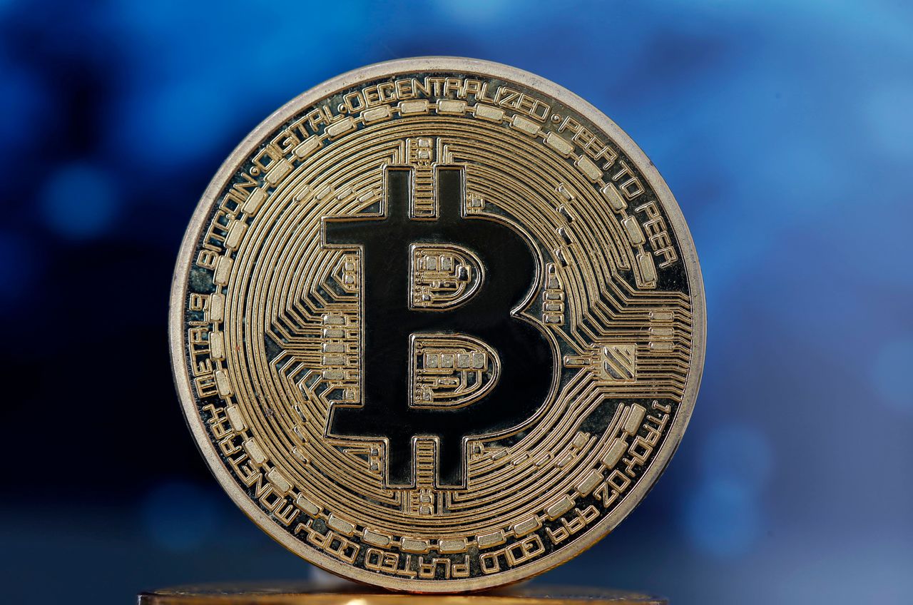 In this photo illustration, a visual representation of the digital Cryptocurrency, Bitcoin is displayed on April 03, 2019 in Paris, France. (Photo by Chesnot/Getty Images)