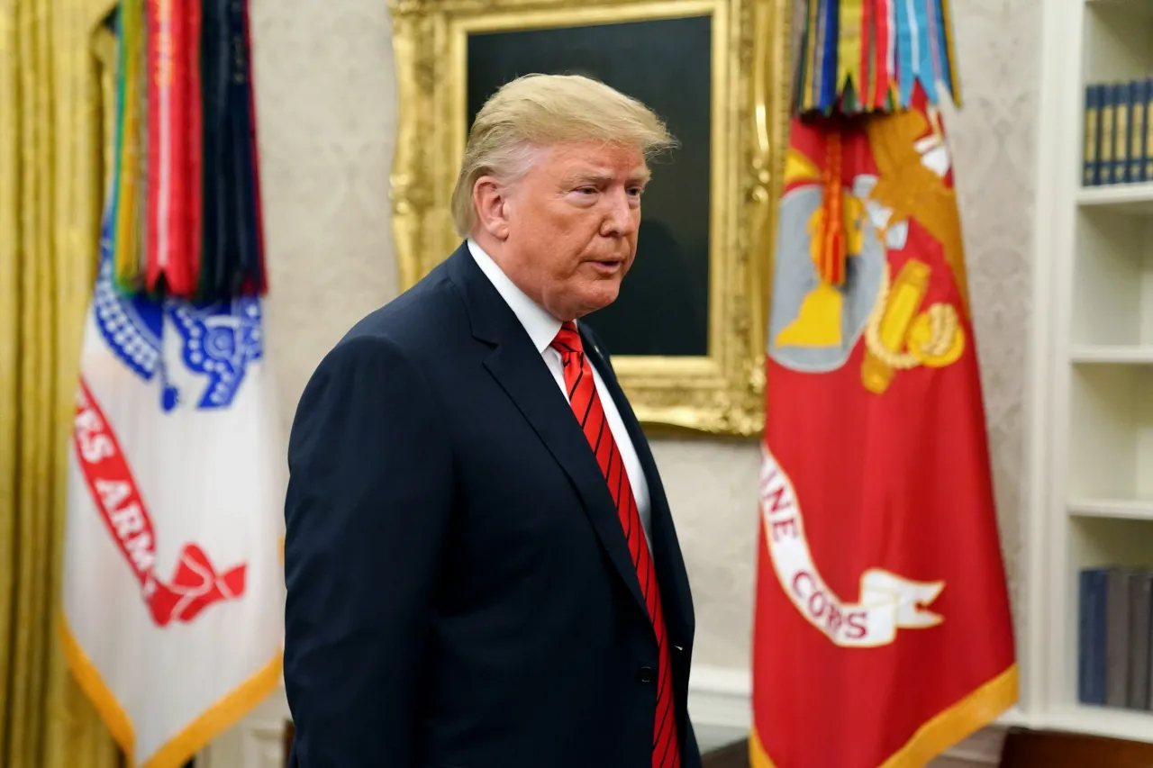 US President Donald Trump gives pauses to answer a reporter’s question at the Oval Office on September 30, 2019. (Photo by Chip Somodevilla/Getty Images)