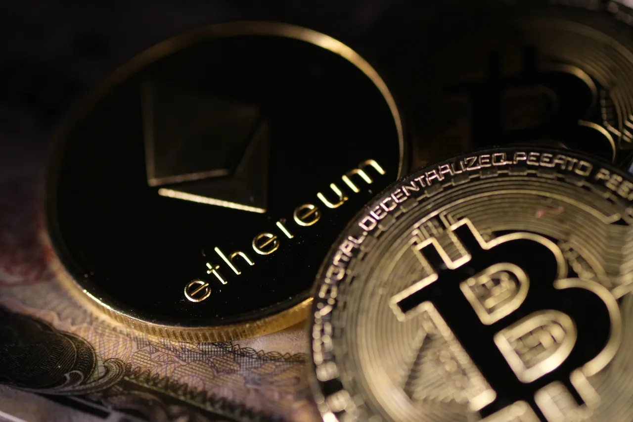 In this photo illustration, visual representations of the digital cryptocurrencies, Bitcoin and Ethereum are pictured atop a Japanese 10,000 yen note on March 20, 2020 in Katwijk, Netherlands. (Photo by Yuriko Nakao/Getty Images)