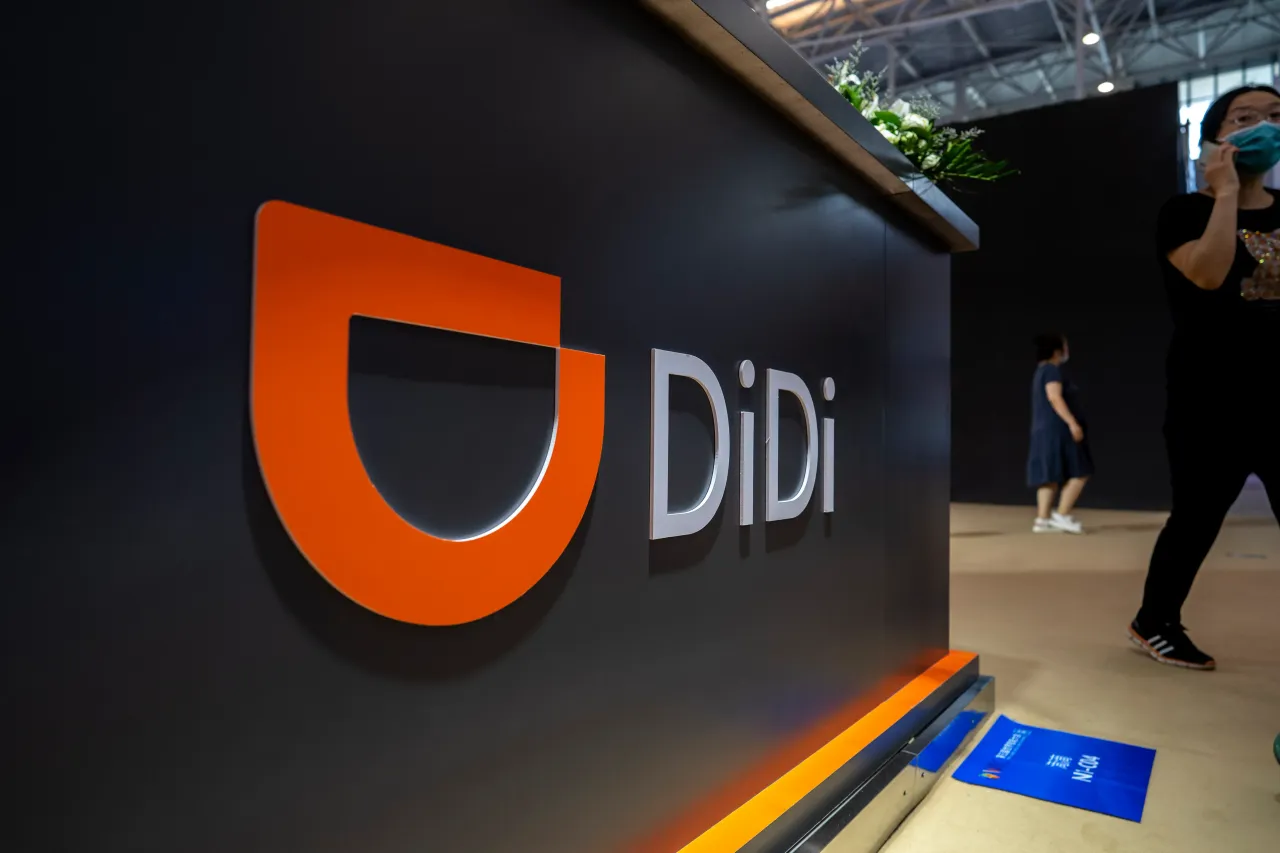 Logo of Didi, at the exhibit booth of Didi Chuxing in the 5th World Intelligence congress in May 2023. (Photo by Zhang Peng/LightRocket via Getty Images)