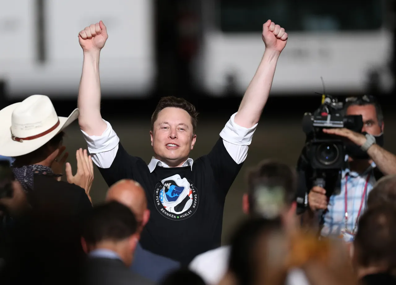 Elon Musk celebrates after the successful launch of the SpaceX Falcon 9 rocket at the Kennedy Space Center on May 30, 2020 in Cape Canaveral, Florida. (Photo by Joe Raedle/Getty Images)
