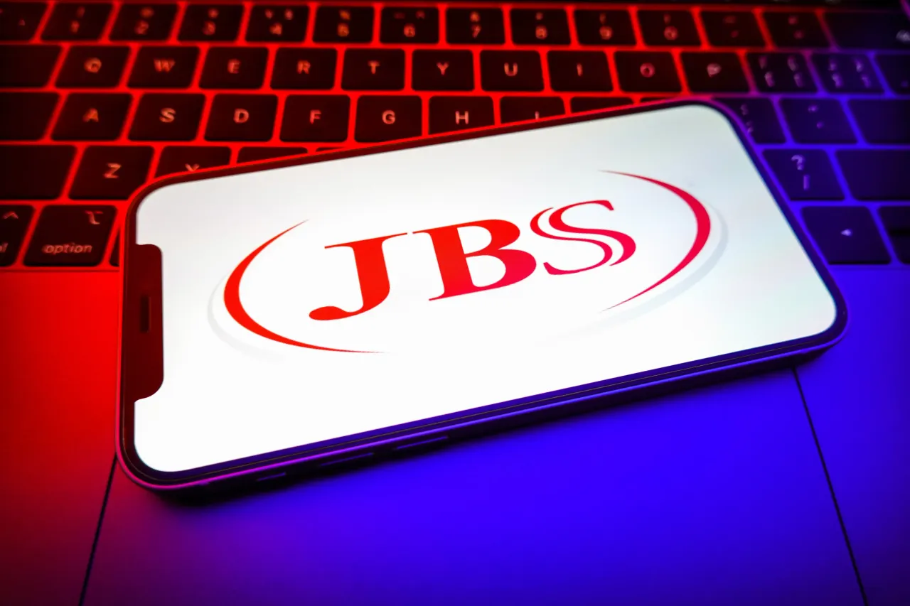 JBS logo is displayed on the screen of a smartphone. (Photo Illustration by Sheldon Cooper/SOPA Images/LightRocket via Getty Images)