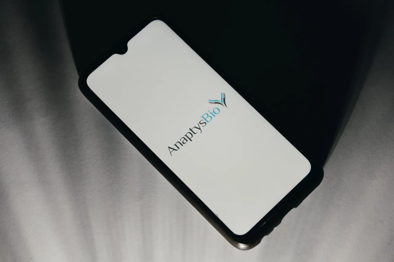 In this photo illustration an AnaptysBio logo is displayed on a smartphone screen in Athens, Greece on January 13, 2023. (Photo illustration by Nikolas Kokovlis/NurPhoto via Getty Images)
