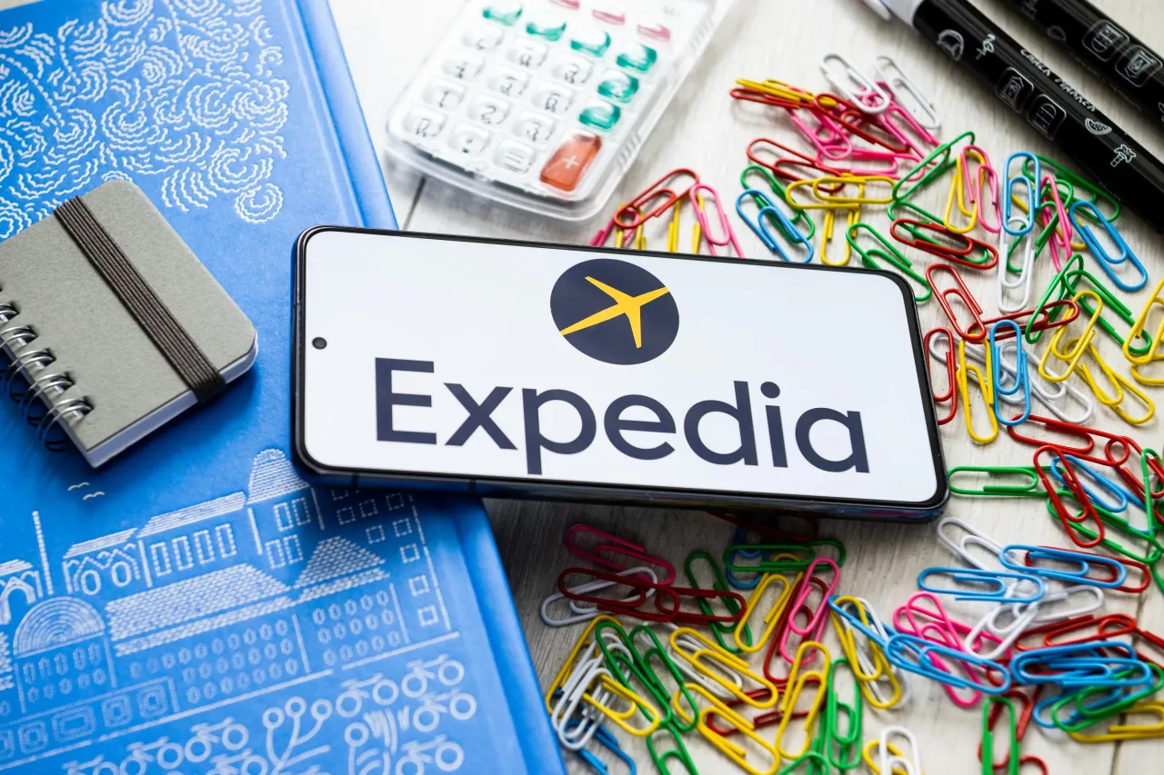 In this photo illustration an Expedia logo seen displayed on a smartphone. (Photo Illustration by Mateusz Slodkowski/SOPA Images/LightRocket via Getty Images)