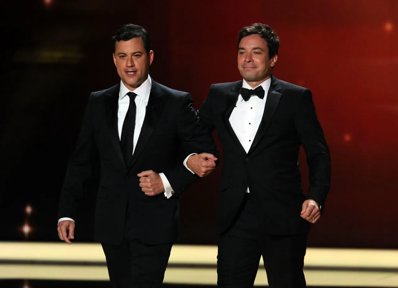 Jimmy Kimmel (L) and Jimmy Fallon speak onstage during the 63rd Annual Primetime Emmy Awards on September 18, 2011 in Los Angeles, California. (Photo by Kevin Winter/Getty Images)