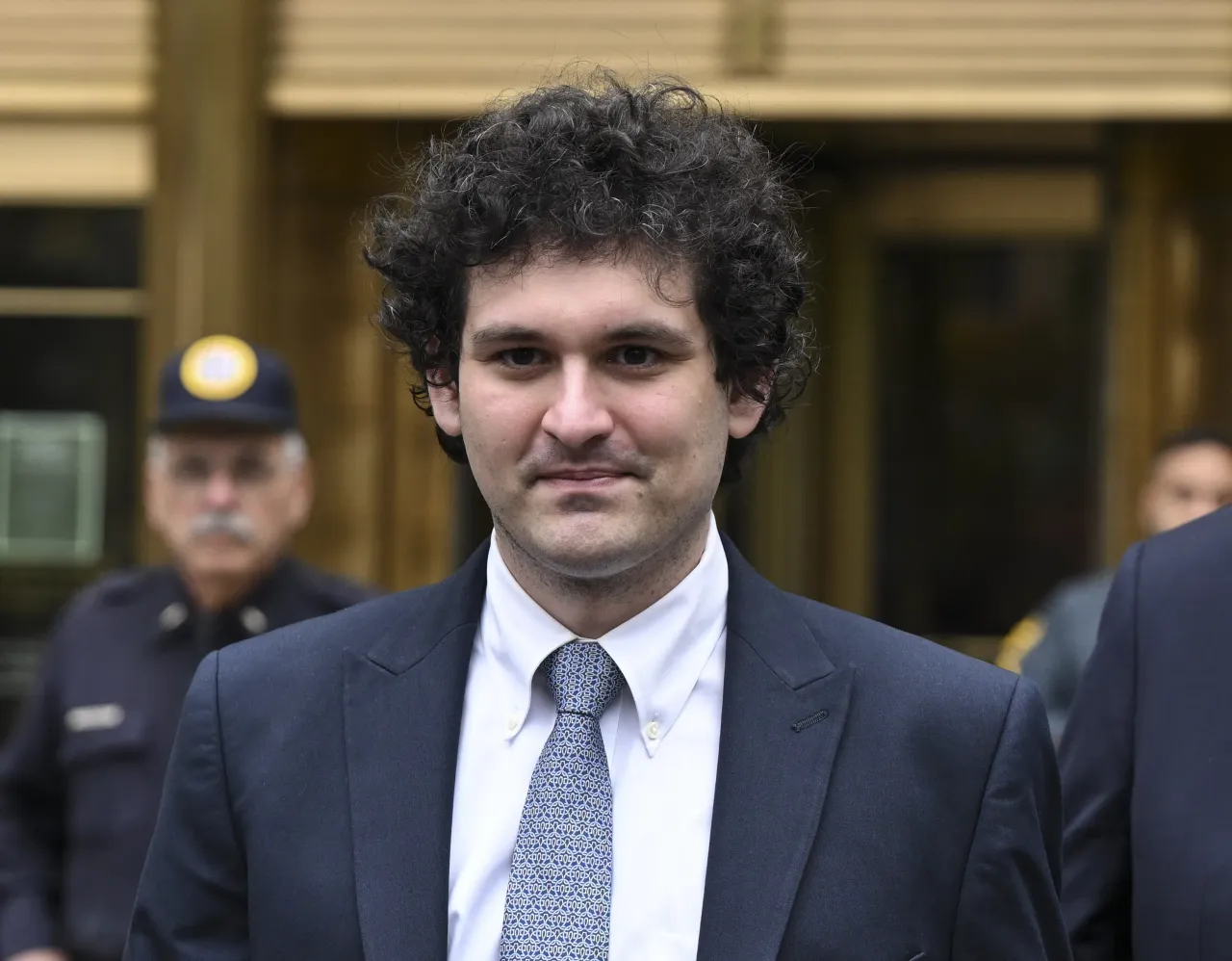 FTX Founder Sam Bankman-Fried leaves from Manhattan Federal Court after court appearance in New York, United States on June 15, 2023. (Photo by Fatih Aktas/Anadolu Agency via Getty Images)