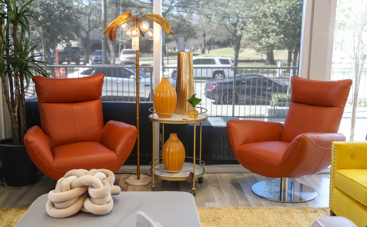 High-end leather chairs displayed at a furniture store in Houston. (Photo by Karen Warren/Houston Chronicle via Getty Images)