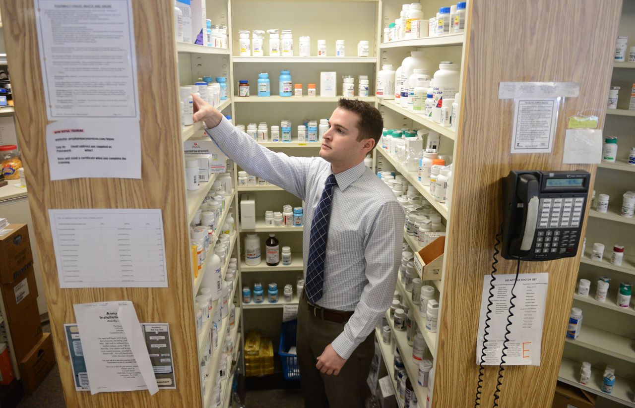Brandon Wiley, Pharm D., pharmacist at Wiley Pharmacy in Lancaster, works at Wiley Pharmacy. Photo by Susan L. Angstadt 1/28/2015 (Photo By Susan L. Angstadt/MediaNews Group/Reading Eagle via Getty Images)
