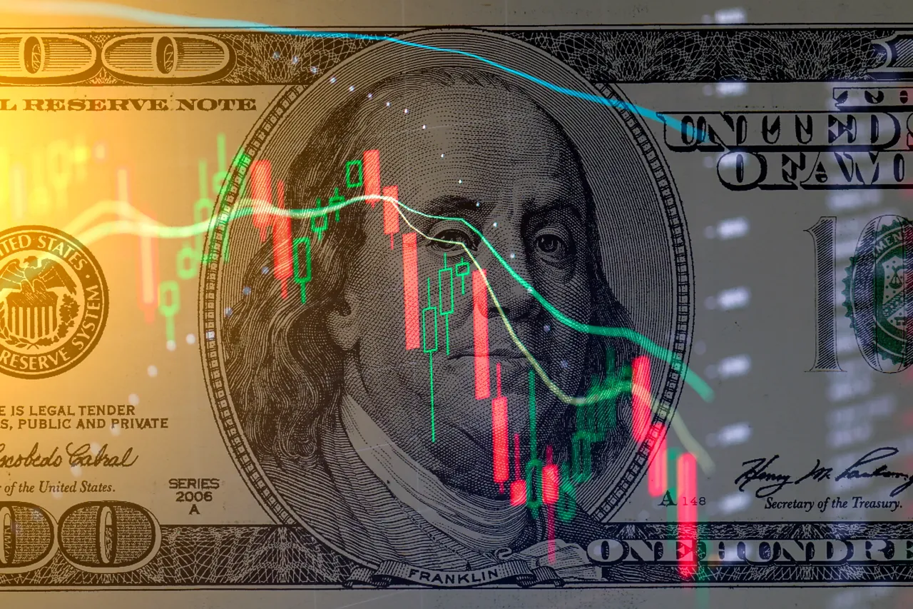 One hundred dollar bill on the background of stock charts. Economic crisis. - stock photo