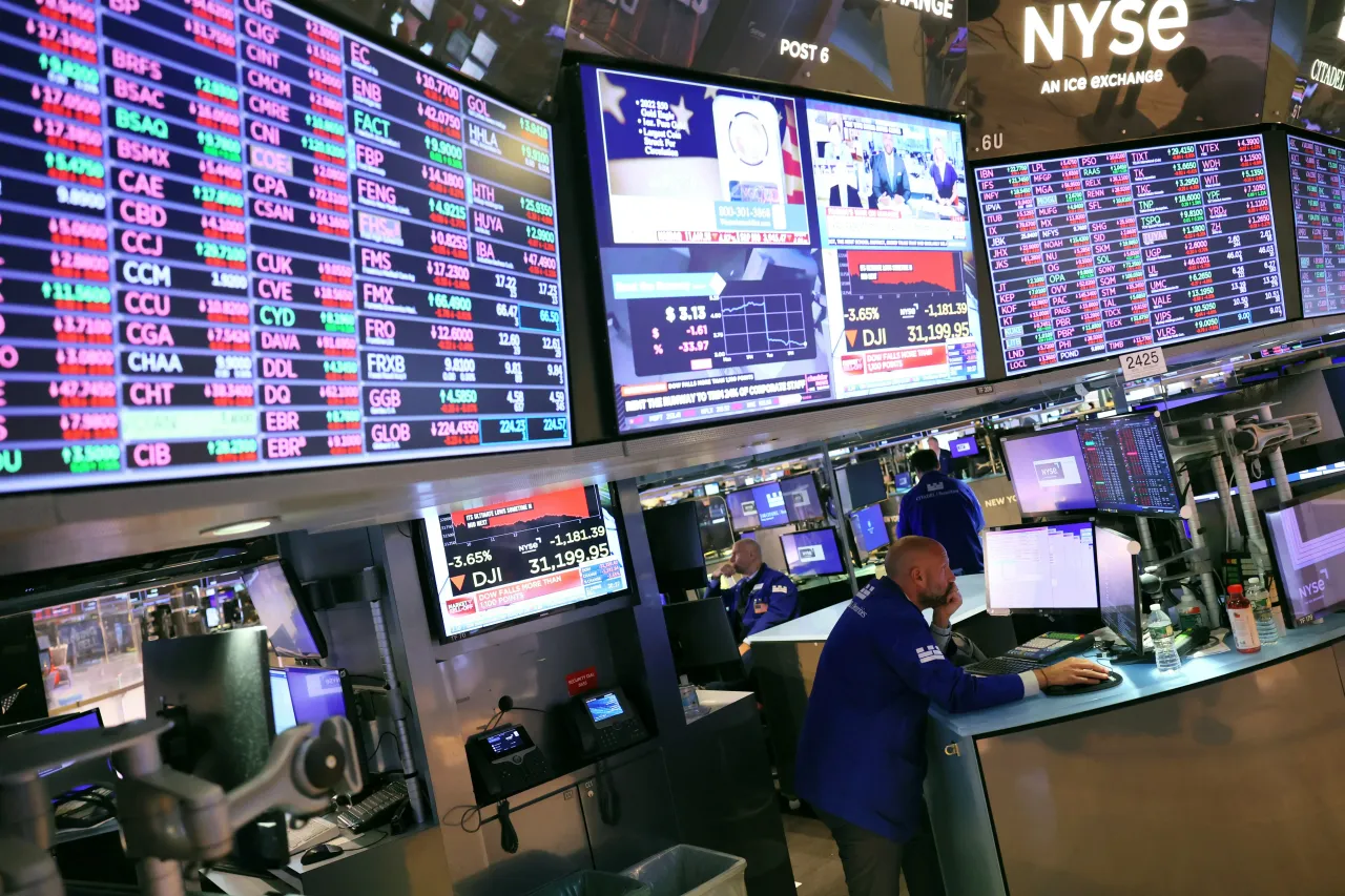 Traders work on the floor of the New York Stock Exchange.