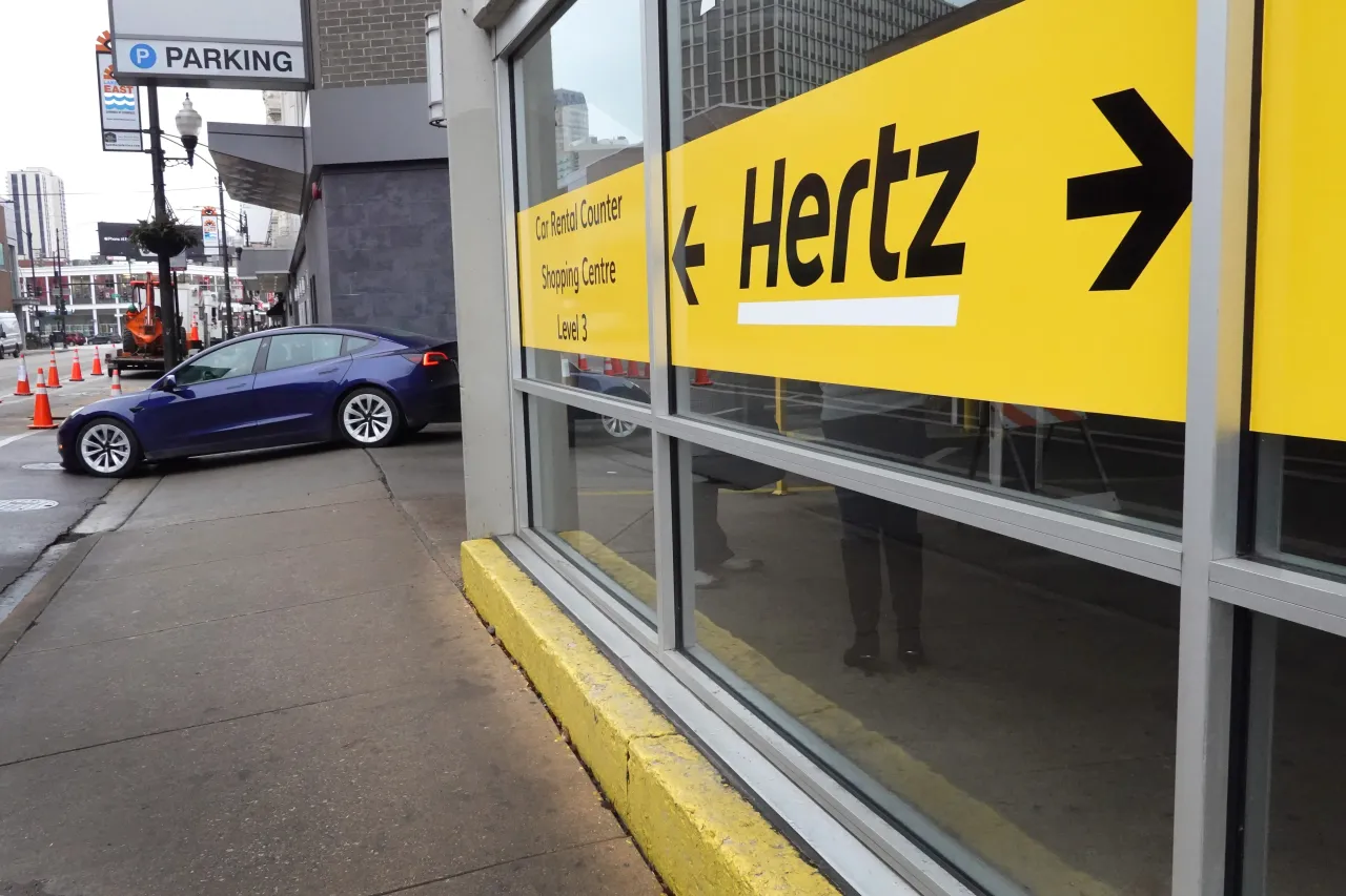 A sign marks the location of a Hertz car rental facility on February 07, 2023 in Chicago, Illinois. (Photo by Scott Olson/Getty Images)