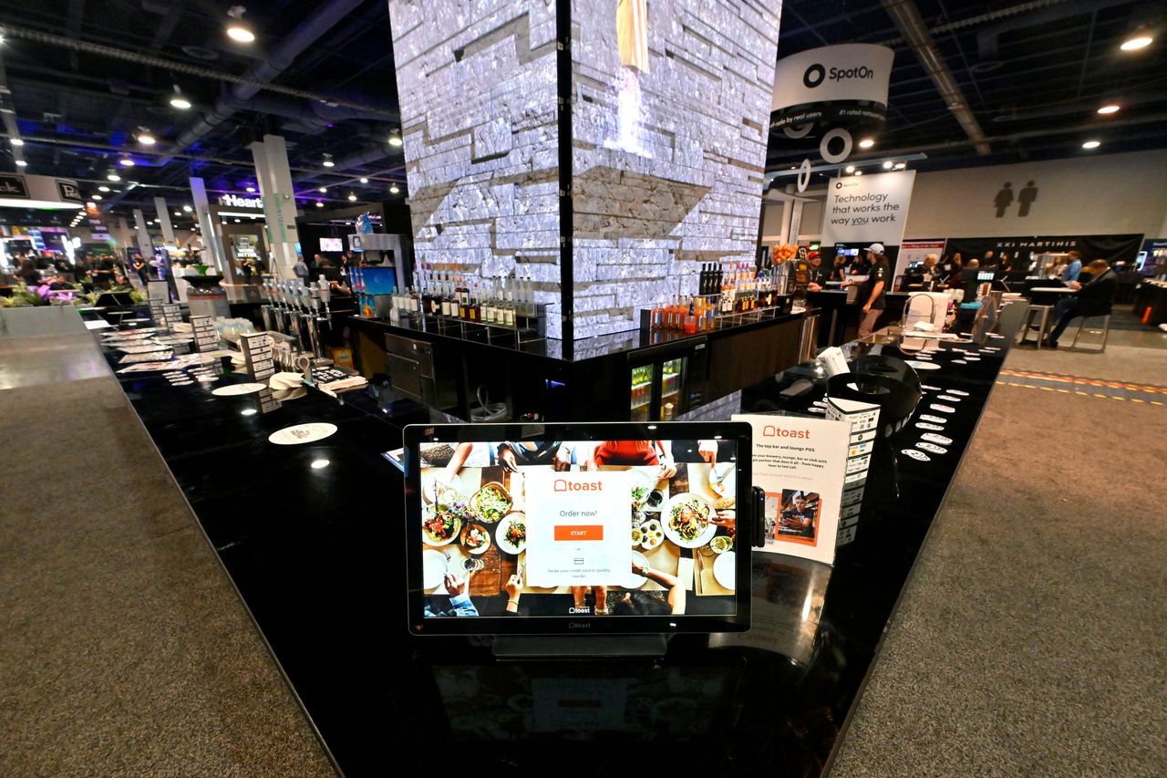 Toast, Inc. display at the 2023 Bar & Restaurant Expo and World Tea Expo at the Las Vegas Convention Center on March 29, 2023 in Las Vegas, Nevada. (Photo by David Becker/Getty Images for Nightclub & Bar Media Group)