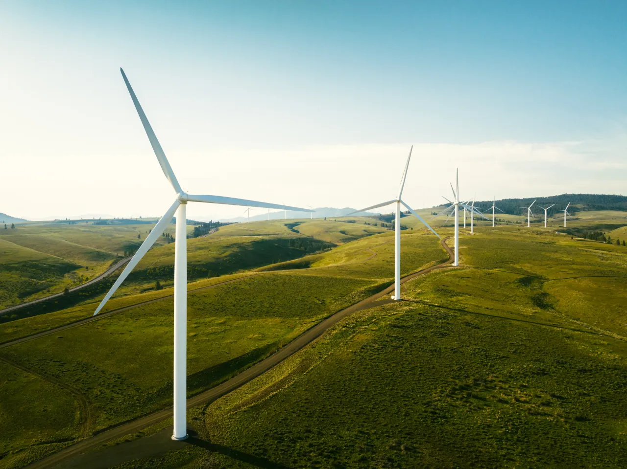 Wind turbines tower above the earth in Washington state, U.S.