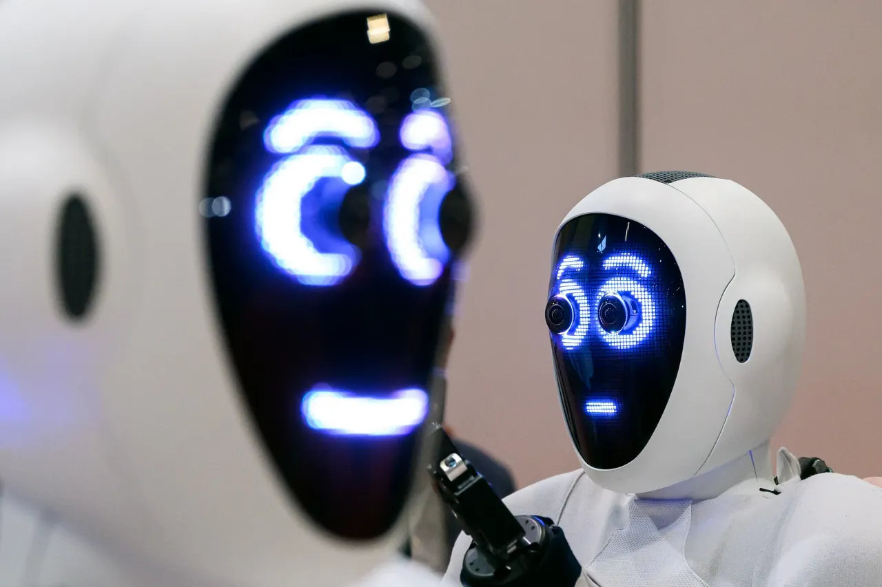 A pair of 1X androids are displayed at the International Conference on Robotics and Automation (ICRA) at ExCel on May 30, 2023 in London, England. (Photo by Leon Neal/Getty Images)