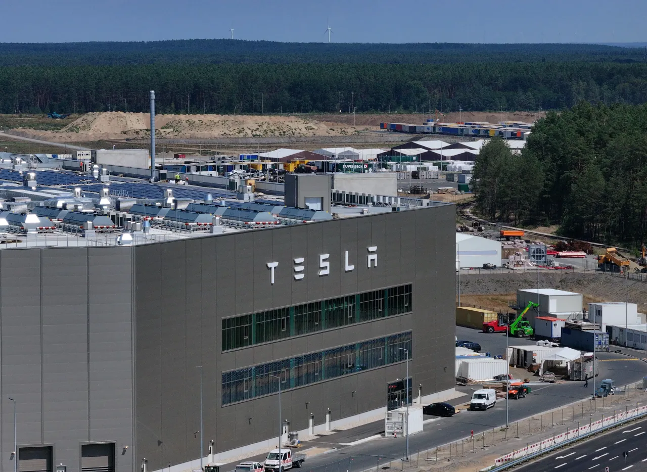In this aerial view the Tesla logo hangs on the facade of a building at the Tesla factory on July 17, 2023 near Gruenheide, Germany. (Photo by Sean Gallup/Getty Images)