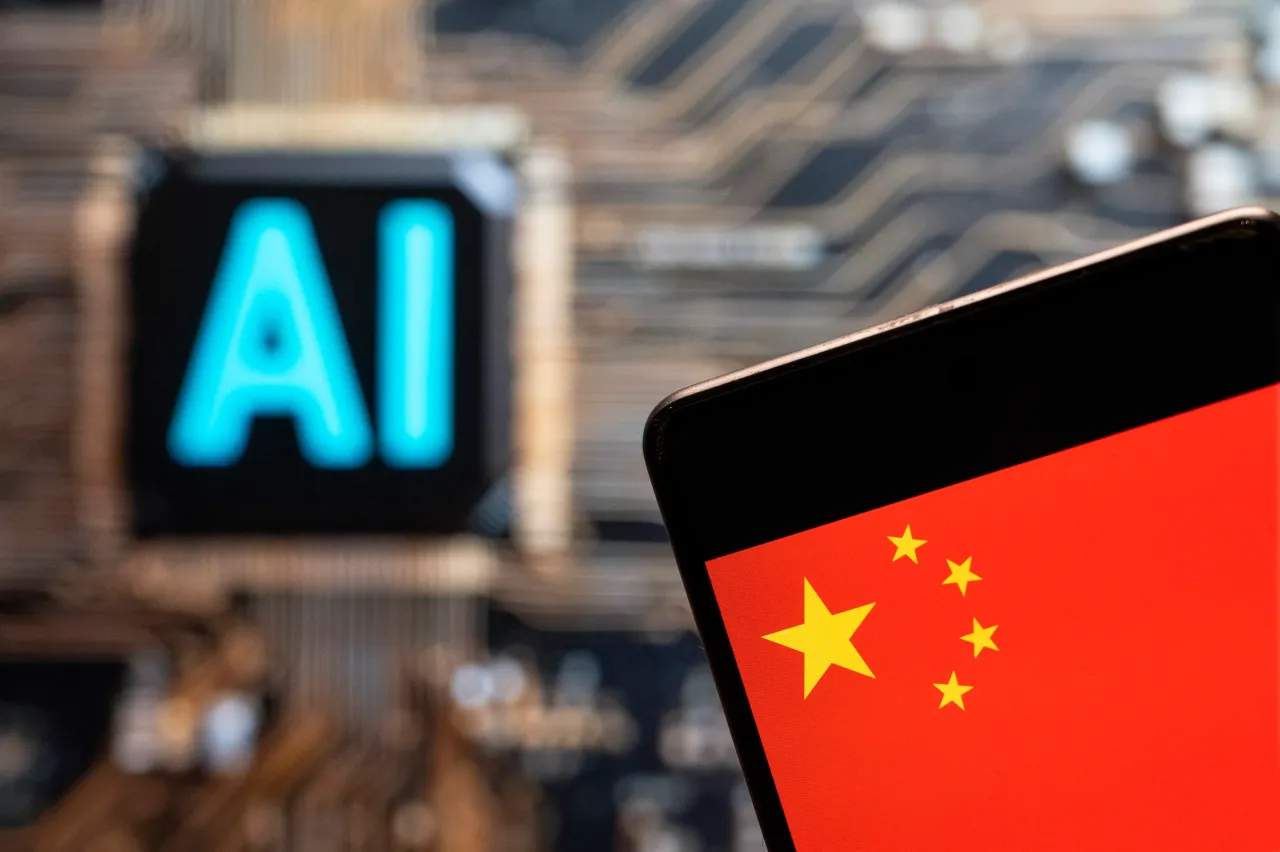 In this photo illustration, the People's Republic of China flag seen displayed on a smartphone with an Artificial intelligence (AI) chip and symbol in the background. (Photo Illustration by Budrul Chukrut/SOPA Images/LightRocket via Getty Images)
