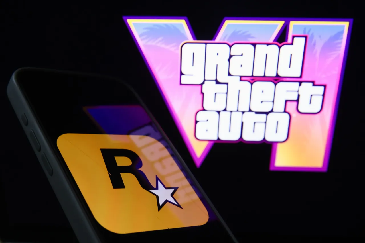 GTA VI logo from the trailer displayed on a laptop screen and Rockstar Games logo displayed on a phone screen are seen in this illustration photo taken in Krakow, Poland on December 5, 2023. (Photo by Jakub Porzycki/NurPhoto via Getty Images)