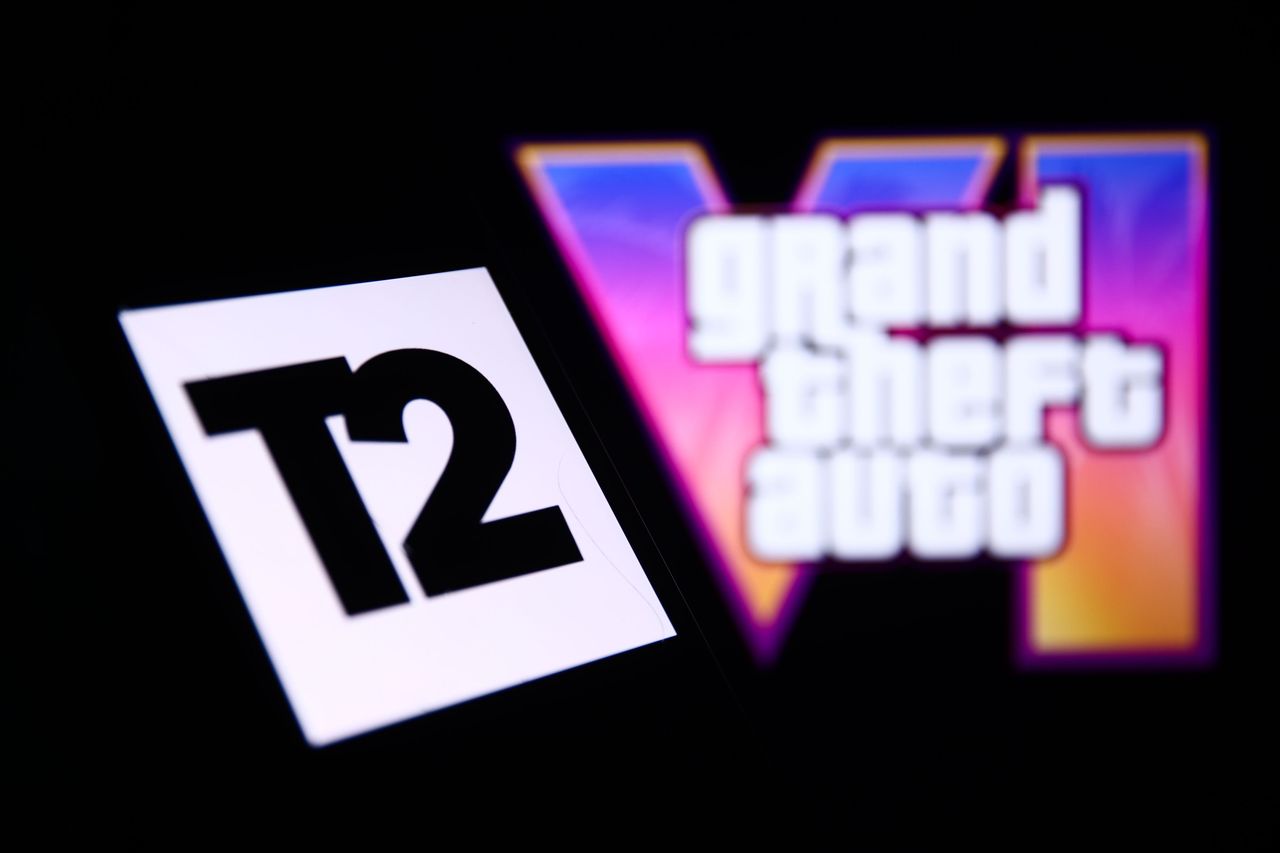 Take-Two Interactive logo displayed on a phone screen and GTA VI logo from the trailer displayed on a laptop screen are seen in this illustration photo taken in Krakow, Poland on December 6, 2023. (Photo by Jakub Porzycki/NurPhoto via Getty Images)