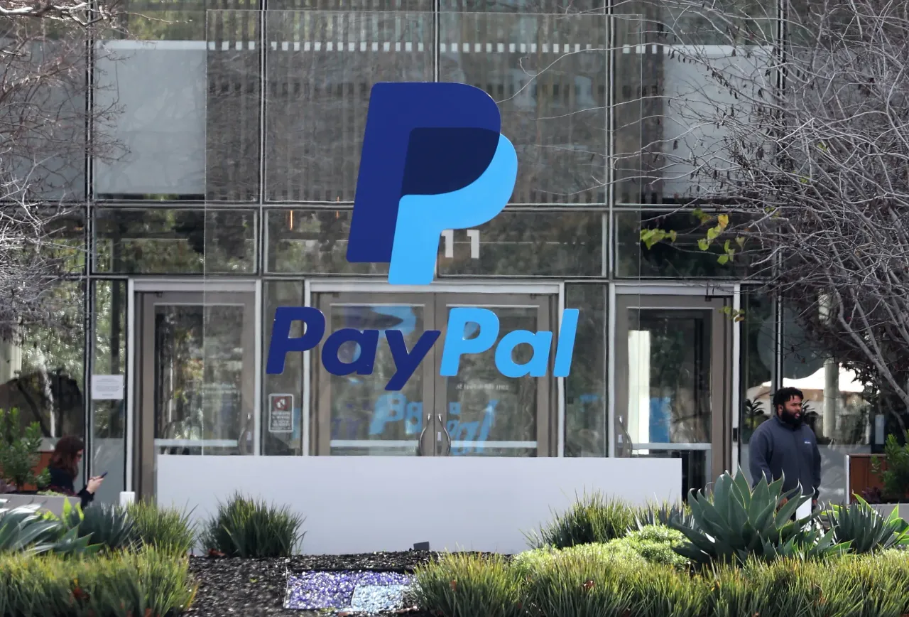 A PayPal sign is seen at its headquarters on January 30, 2024 in San Jose, California. (Photo by Justin Sullivan/Getty Images)
