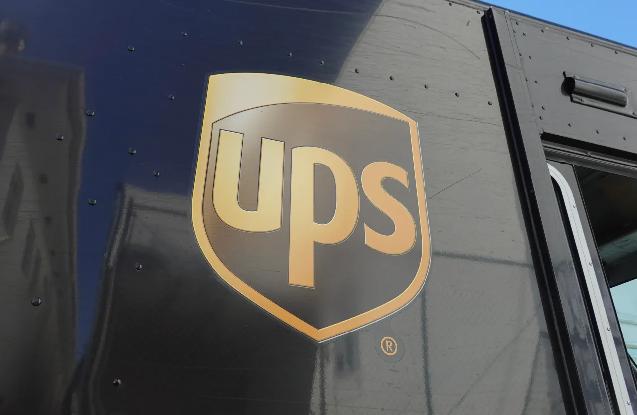 A UPS truck is parked as a driver makes a delivery on January 30, 2024 in Miami Beach, Florida.