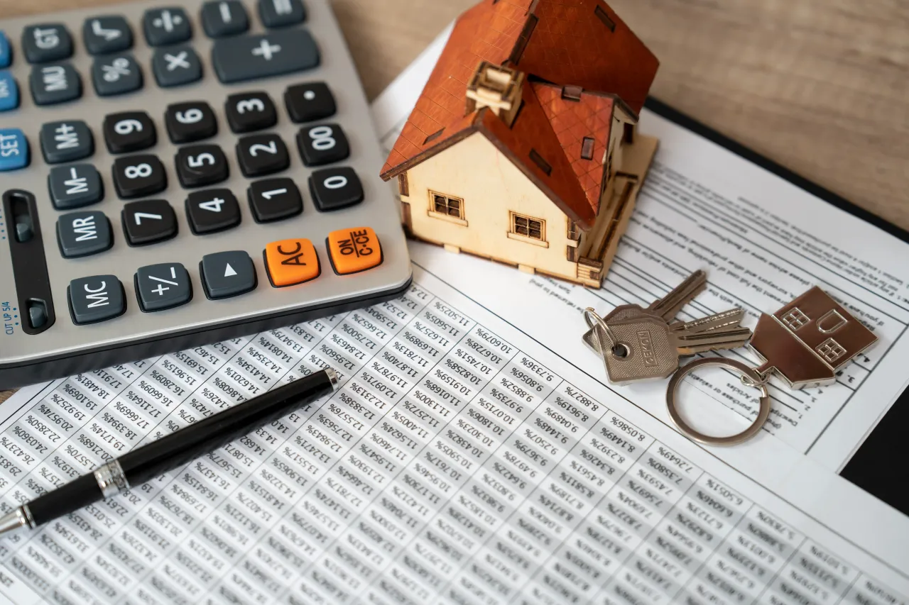 Money, pile coin with saving book and paper home. Fannie Mae and Freddie Mac rose sharply on Monday. (Picture source: Getty Images)