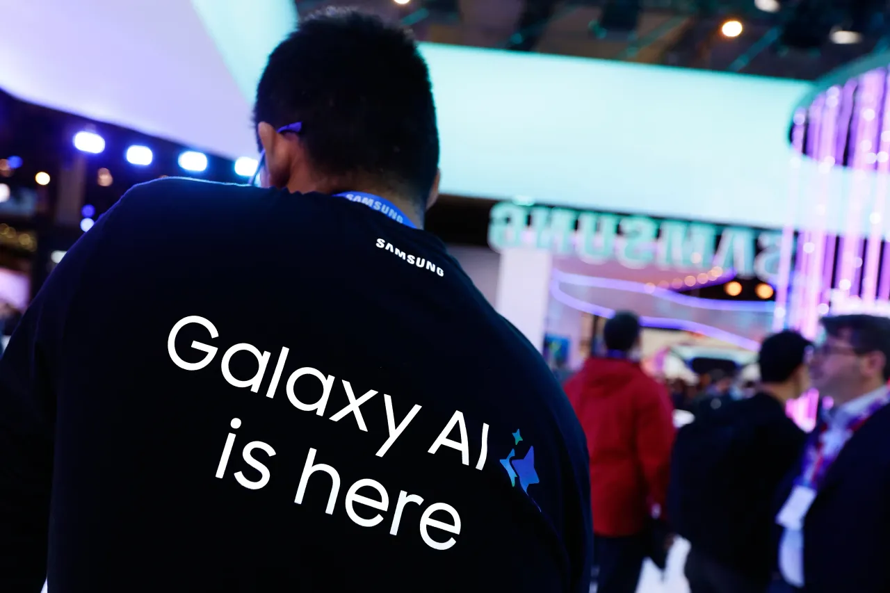 An employee is wearing tshirt with the slogan 'Samsung's Galaxy AI is here' to launch the Google-powered AI features on Galaxy S24 smartphones at the Mobile World Congress 2024. (Photo by Joan Cros/NurPhoto via Getty Images)