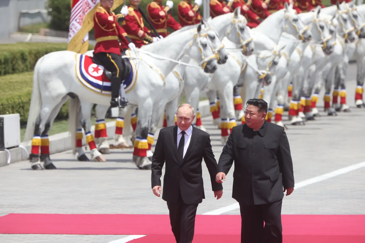 Russian President Vladimir Putin (L) and North Korean Supreme Leader Kim Jong Un (R) attend a welcoming ceremony on June 19, 2024 in Pyongyang, North Korea. (Photo by Contributor/Getty Images)