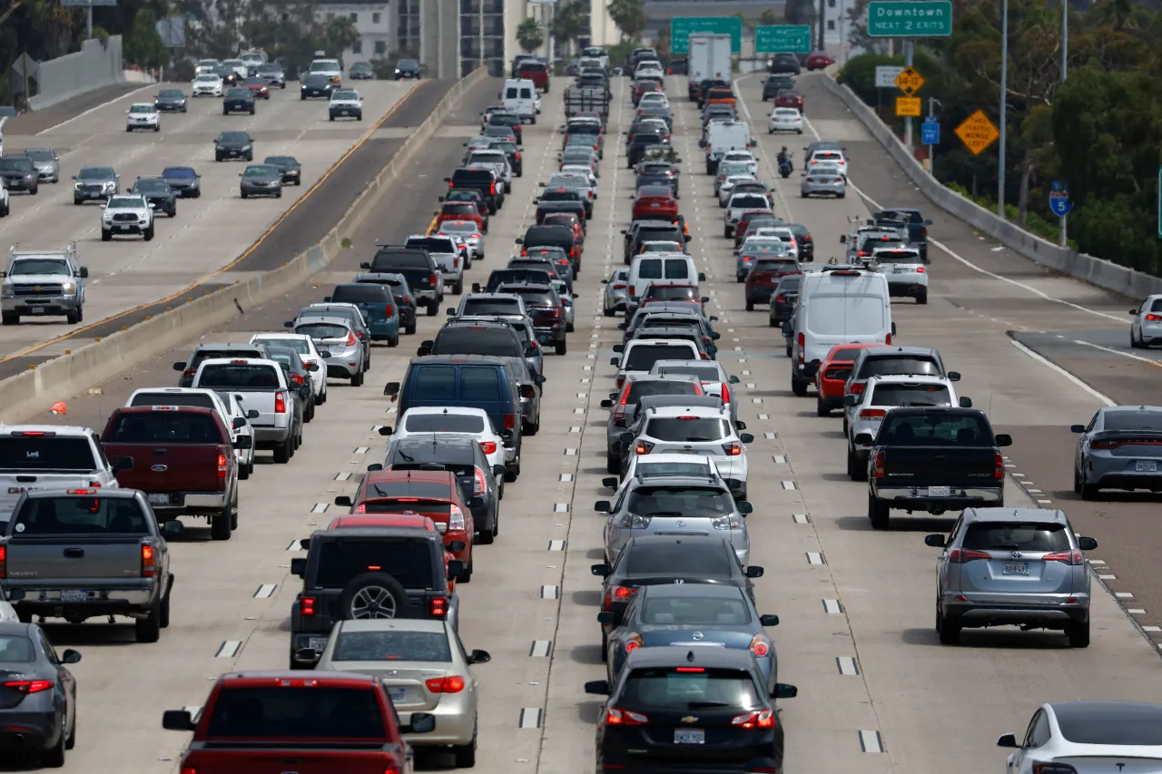Drivers sit in traffic on southbound Interstate 5 during the afternoon commute heading into downtown San Diego on June 28, 2024 in San Diego, California.