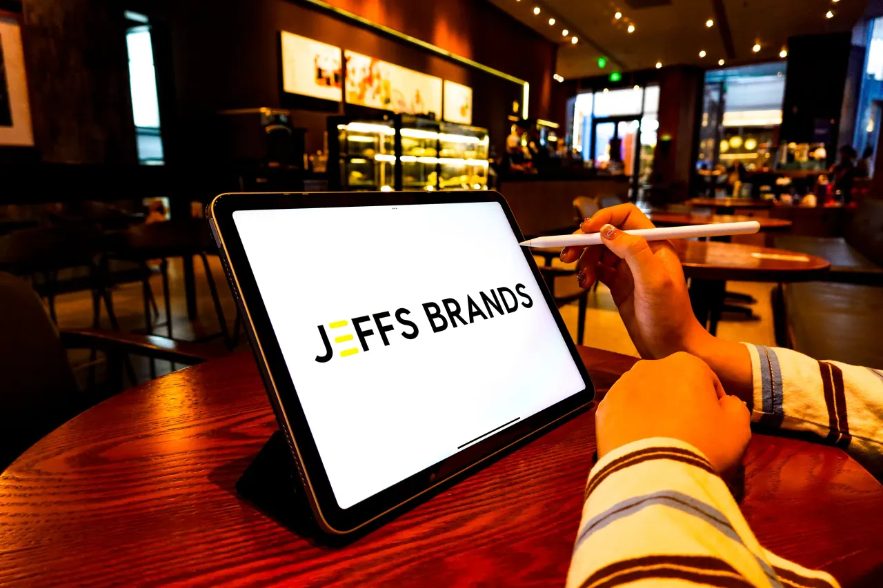 A Jeffs' Brands logo is displayed on the screen of an iPad. (Photo Illustration by Sheldon Cooper/SOPA Images/LightRocket via Getty Images)