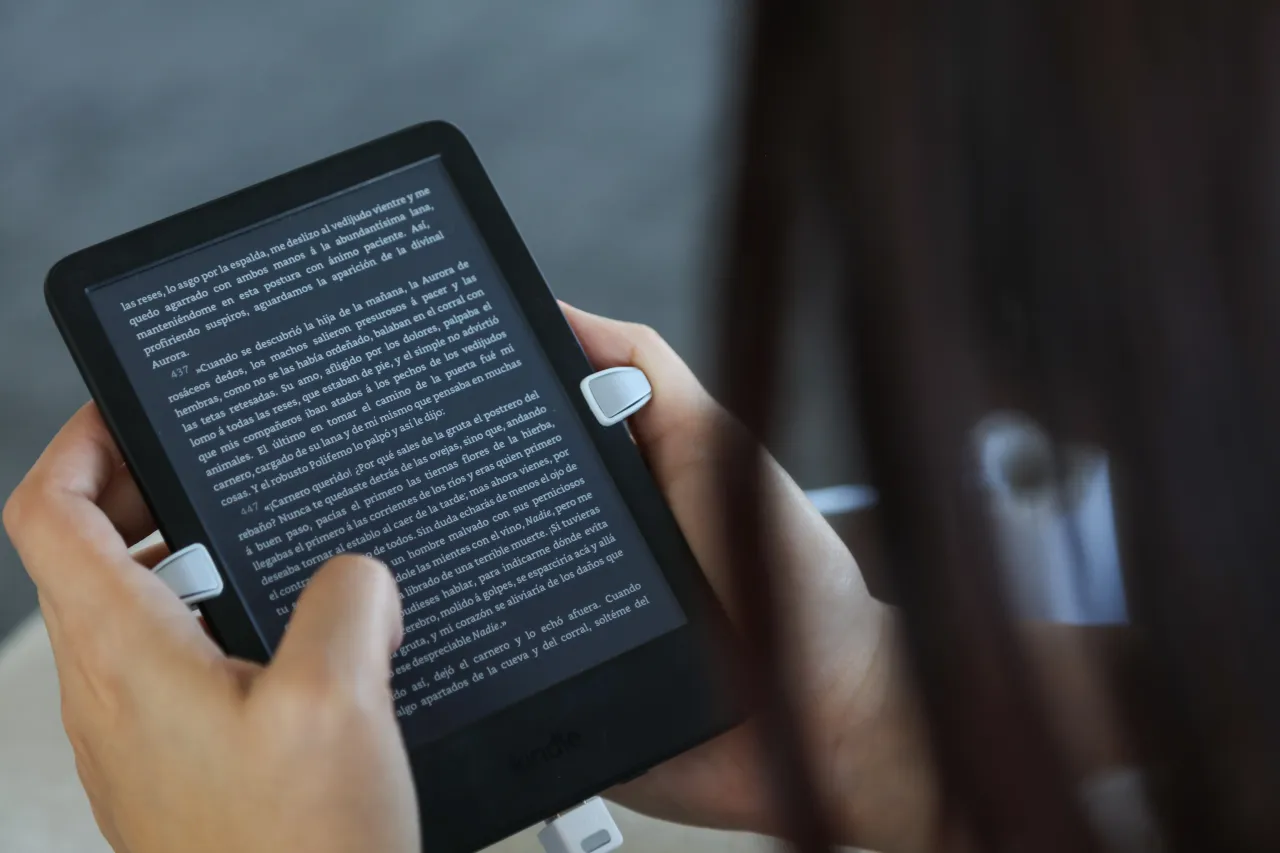 A person reads on an Amazon Kindle at the National Library of El Salvador (BINAES), in San Salvador, El Salvador on October 22, 2024. (Photo by Alex Pena/Anadolu via Getty Images)