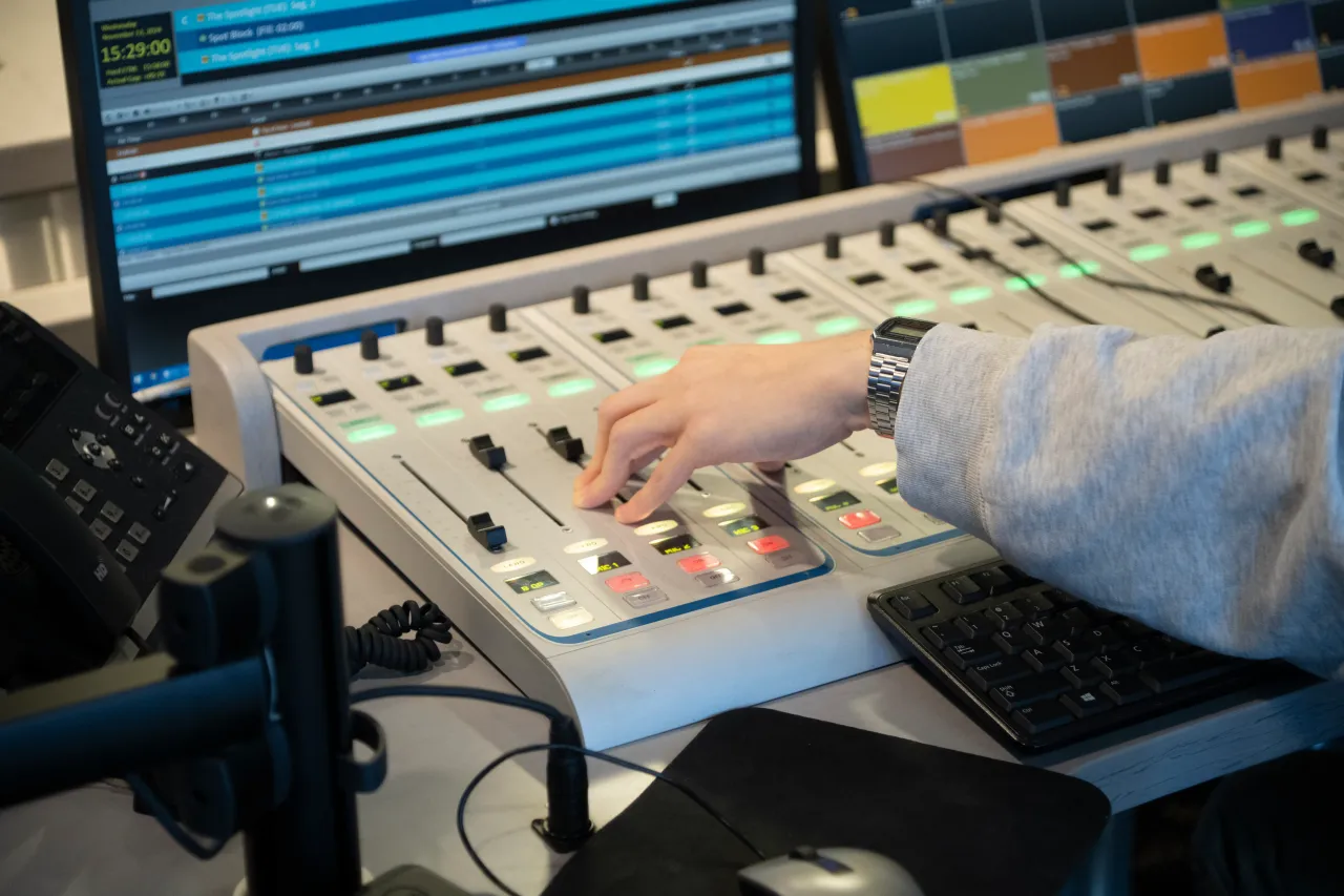 A person uses a sound mixer, pictured on November 13, 2024. (Photo by Noam Galai/Getty Images)