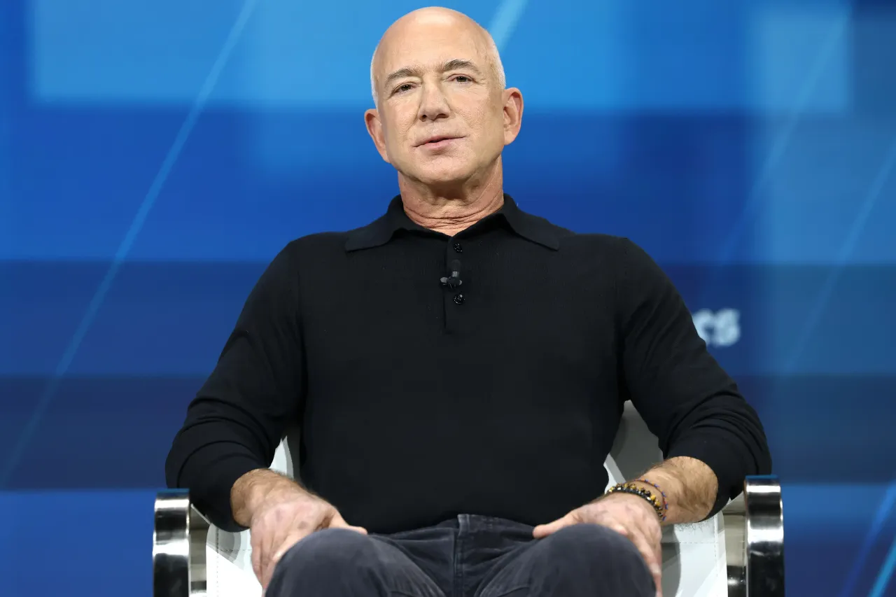 Jeff Bezos, founder and executive chairman of Amazon and owner of the Washington Post, speaks during the New York Times annual DealBook summit on December 04, 2024. (Photo by Michael M. Santiago/Getty Images)