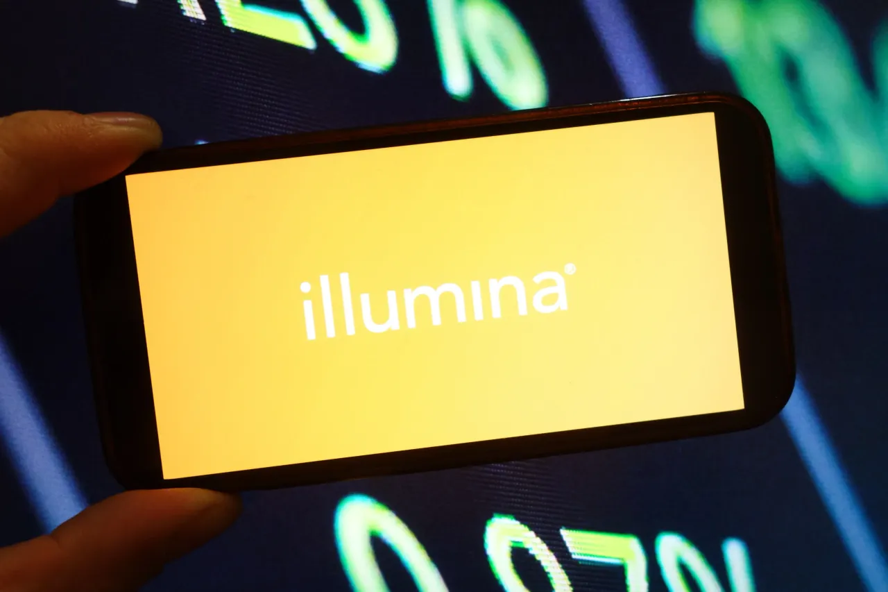In this photo illustration, the Illumina Inc company logo is seen displayed on a smartphone screen. (Photo Illustration by Piotr Swat/SOPA Images/LightRocket via Getty Images)