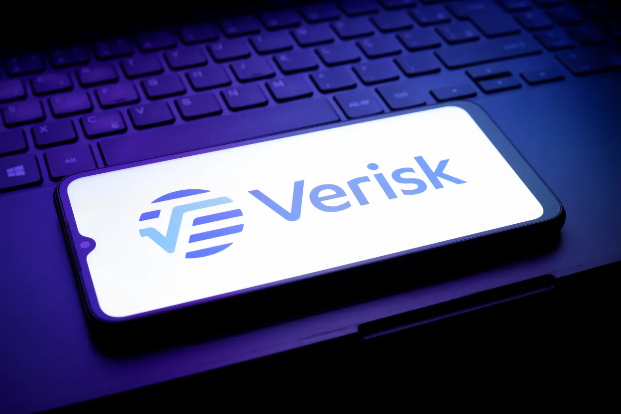 The Verisk Analytics, Inc. logo appears on a smartphone screen in this illustration photo in Reno, United States, on December 31, 2024. (Photo Illustration by Jaque Silva/NurPhoto via Getty Images)