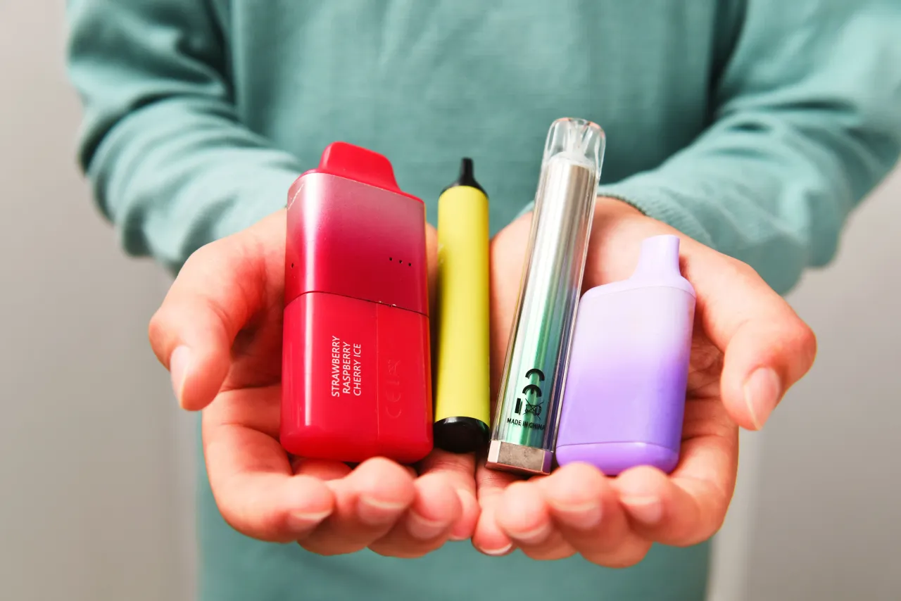 In this photo illustration a 13 year old schoolboy holds single-use Vapes for Recycling in Kingston on Thames, England. (Photo by Peter Dazeley/Getty Images)