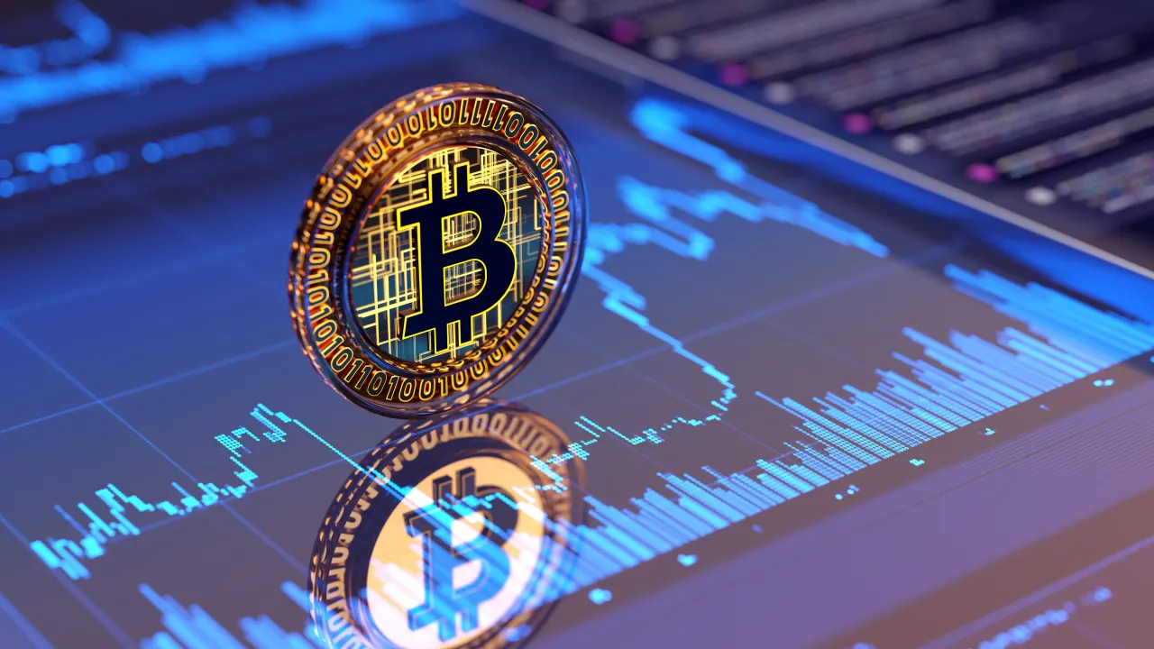 The bitcoin sign above a chart.