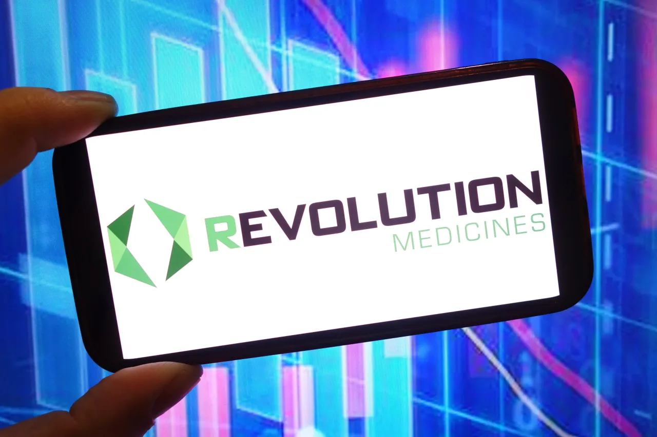 In this photo illustration, the Revolution Medicines company logo is seen displayed on a smartphone screen. (Photo Illustration by Piotr Swat/SOPA Images/LightRocket via Getty Images)