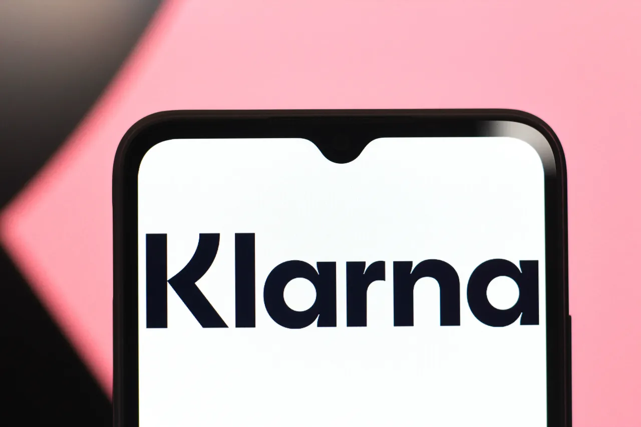  In this photo illustration, the Klarna Bank AB logo is seen displayed on a smartphone screen. (Photo Illustration by Thomas Fuller/SOPA Images/LightRocket via Getty Images)