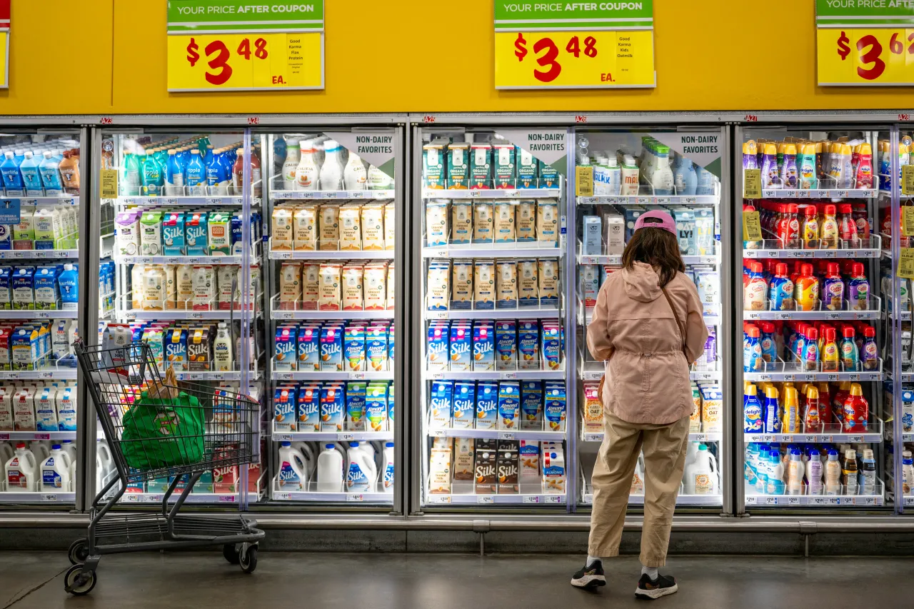 A customer shops for produce at an H-E-B grocery store on February 12, 2025 in Austin, Texas.