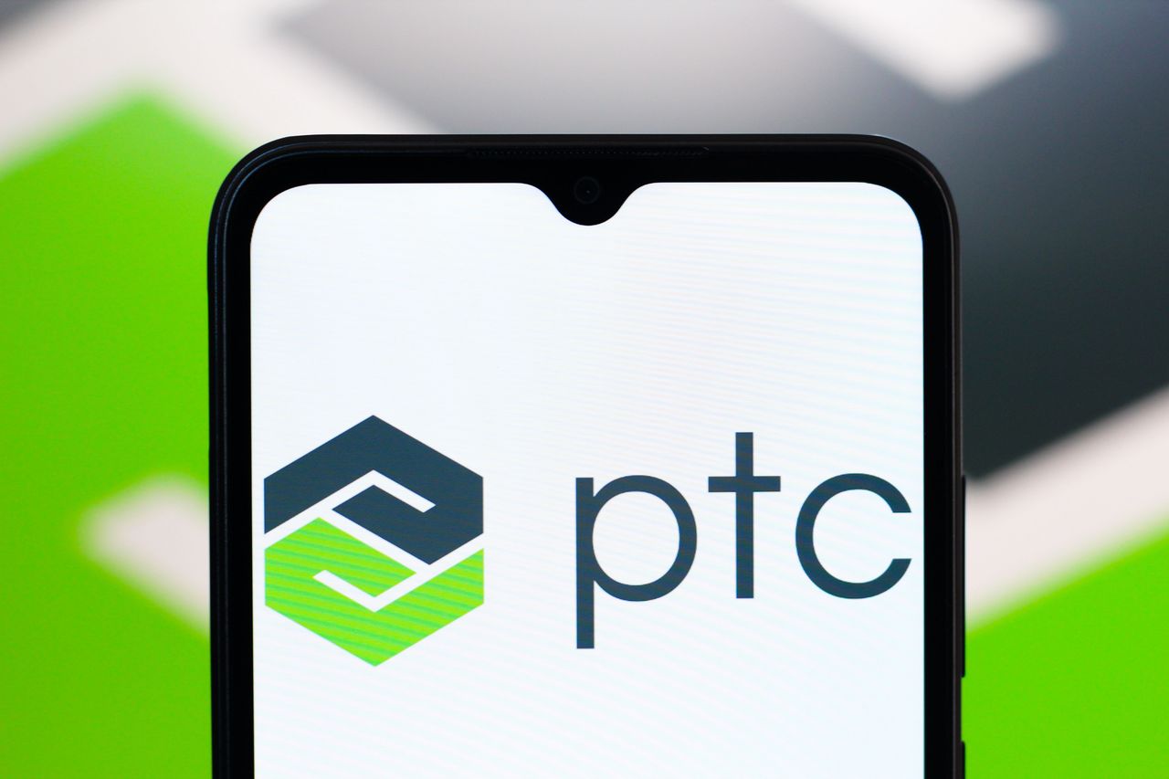 The PTC Inc. logo is seen displayed on a smartphone screen. (Photo Illustration by Thomas Fuller/SOPA Images/LightRocket via Getty Images)