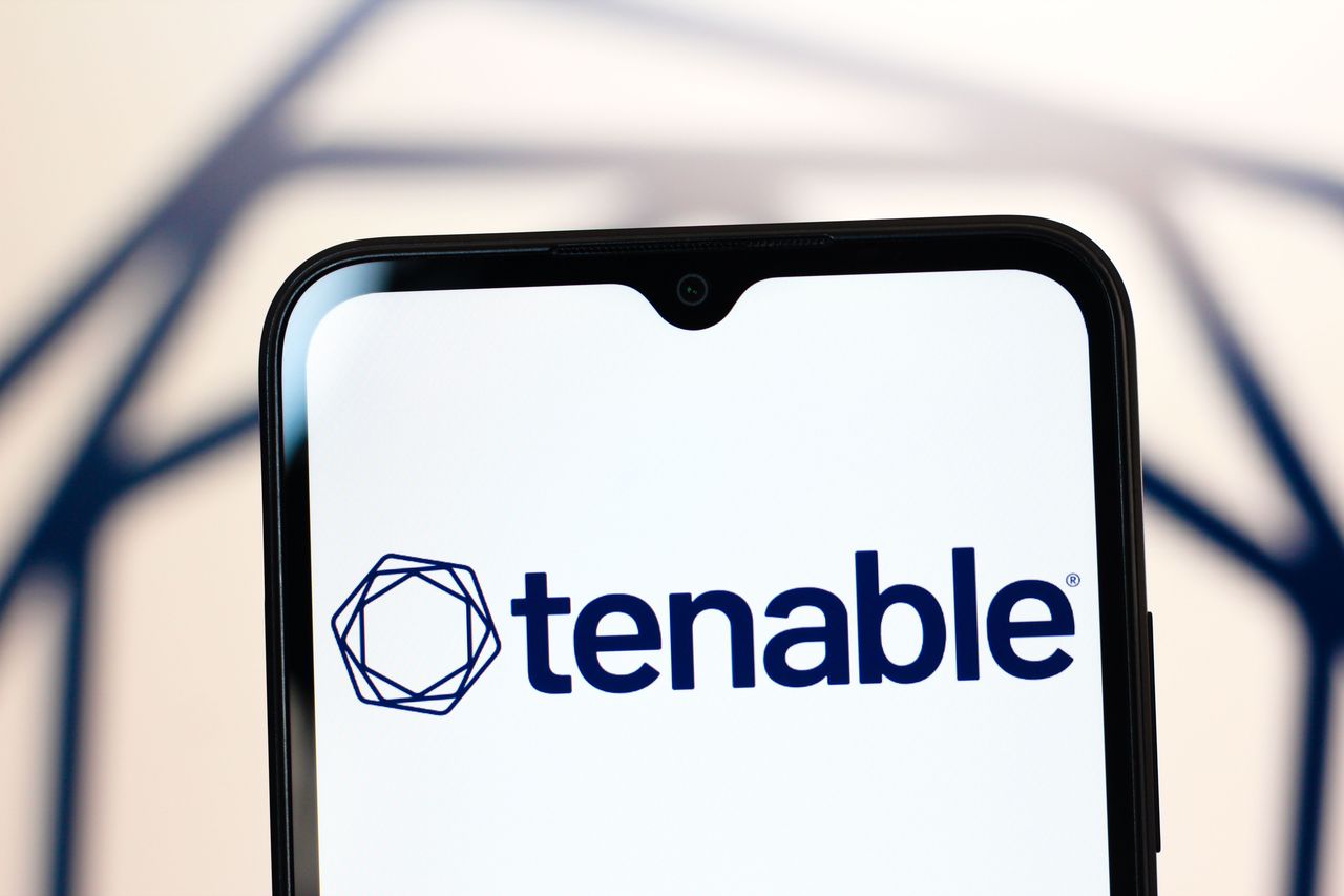 In this photo illustration, the Tenable Holdings Inc. logo is seen displayed on a smartphone screen. (Photo Illustration by Thomas Fuller/SOPA Images/LightRocket via Getty Images)