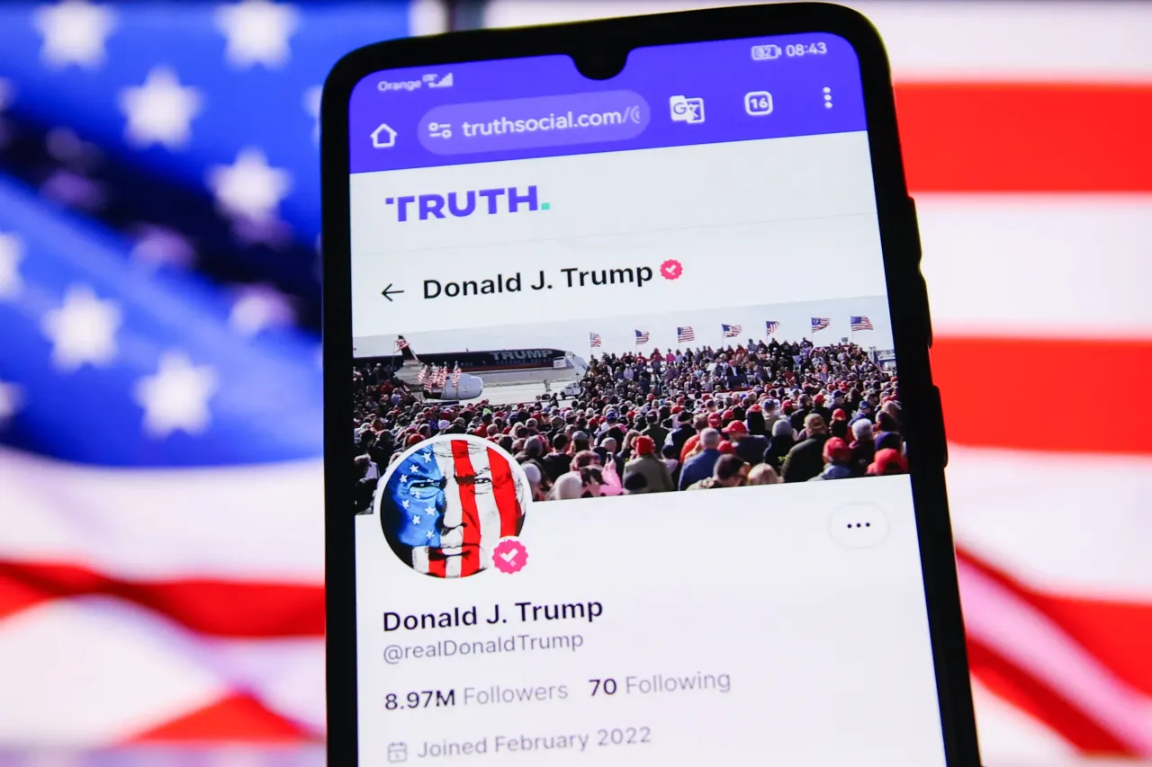US President Donald J. Trump official 'Truth' account is displayed on a mobile phone screen with U.S. flag in the background. (Photo by Beata Zawrzel/NurPhoto via Getty Images)
