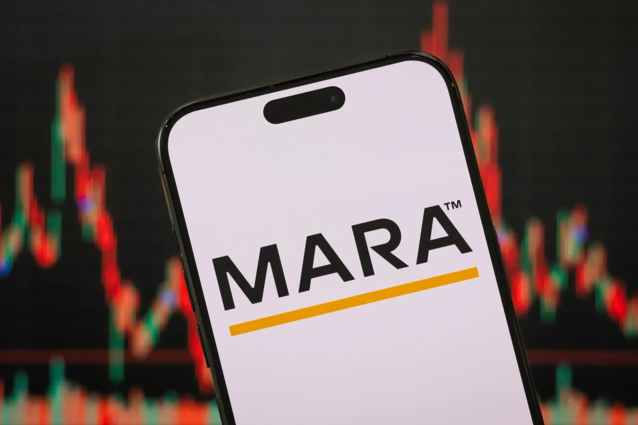 In this photo illustration, the Marathon Digital Holdings (MARA) logo is displayed on a smartphone screen.
